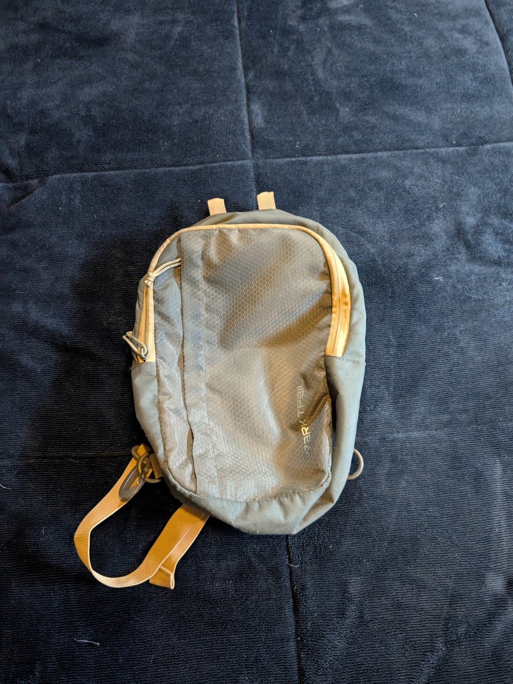 Compact Olive Green Sling Bag with Tan Accents